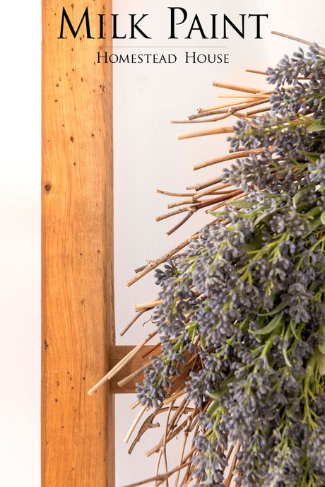 Milk Paint Wood Stain by Fusion sign with wooden frame and dried lavender.