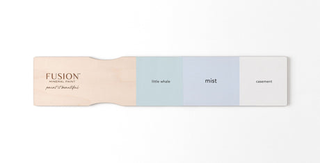 Wooden stir stick with matte samples of Little Whale, Mist Fusion Mineral Paint, and Casement by Fusion.
