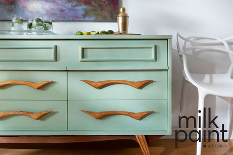 Dresser in Mojito Milk Paint by Fusion Mineral Paint with wood handles, holding drinks and limes.