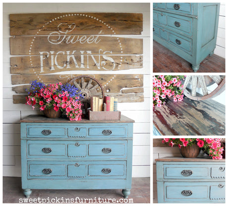 Moody Blue dresser with floral design, painted in non-toxic Old Fashioned Milk Paint, wagon wheel and wood sign decor.