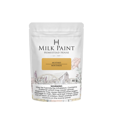Homestead House Mustard Milk Paint in a white pouch with inhalation and exposure warning at the bottom.