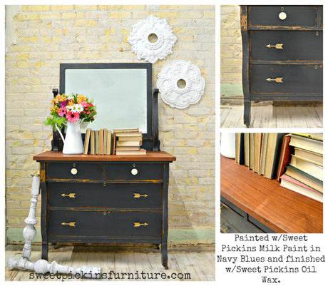 Dresser painted in Navy Blues by Old Fashioned Milk Paint, styled with books and flowers.