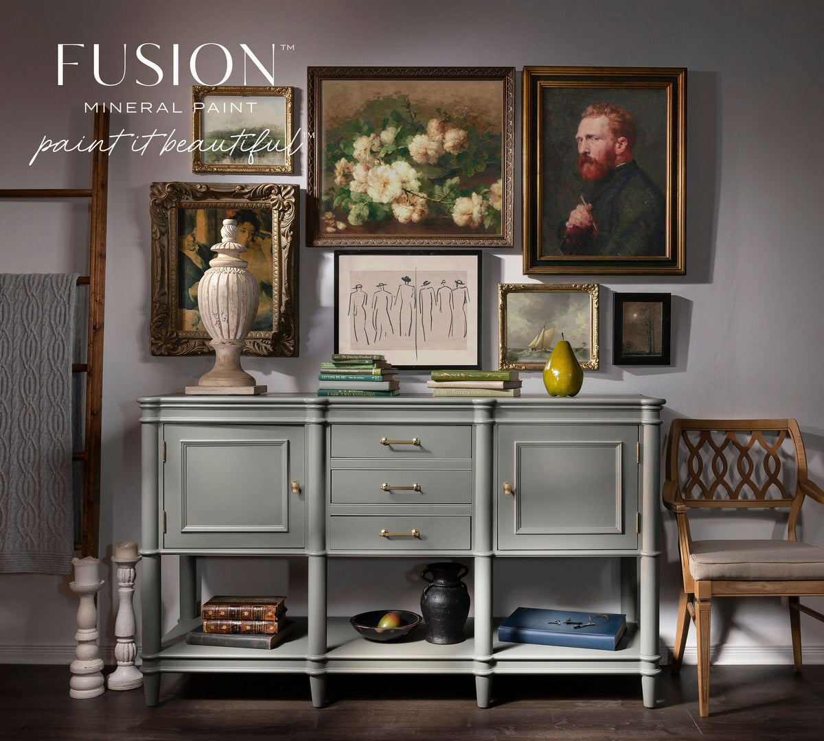 Light sage green sideboard painted in Newell Fusion Mineral Paint with art, books, and Fusion logo on wall above.