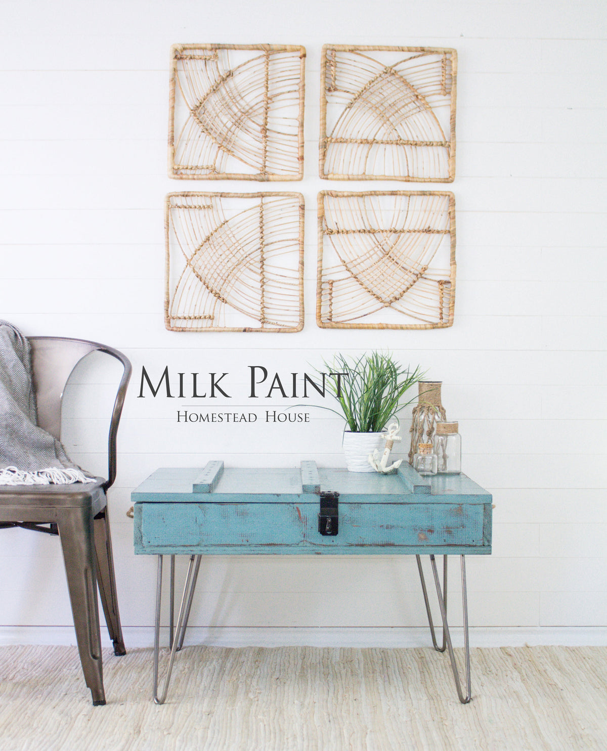 Table painted with Niagara Green Milk Paint by Homestead House placed beside a metal chair.