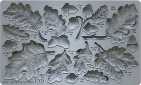 I.O.D. Oak Leaves & Acorns Mould tray in gray with labeled leaf and acorn shapes, ml and gram sizes indicated.