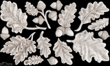 Sixteen I.O.D. Oak Leaves & Acorns Mould castings arranged on a bold black background.