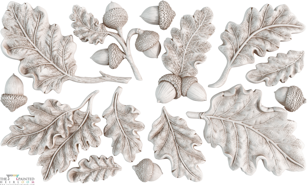 Oak Leaves & Acorns Mould by IOD with I.O.D. pieces in a carved style on white background.