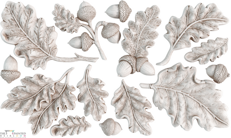Oak Leaves & Acorns Mould by IOD with I.O.D. pieces in a carved style on white background.