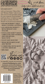 Hand pressing I.O.D. Oak Leaves & Acorns Mould; completed mould pieces displayed on beige surface.