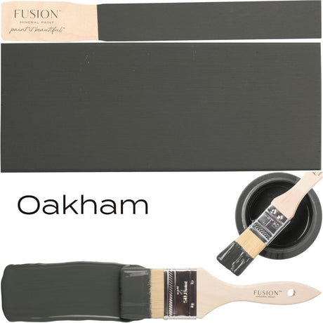 Oakham, a deep grey-green Fusion Mineral Paint swatch and brush with matte finish.