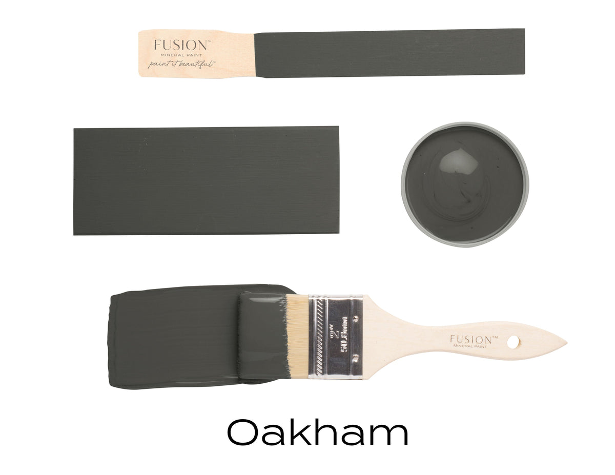 Oakham Fusion Mineral Paint brush and sample display in dark gray matte finish by Fusion.
