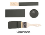Oakham Fusion Mineral Paint brush and sample display in dark gray matte finish by Fusion.