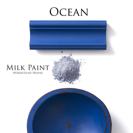 Blue wooden trim, Ocean Milk Paint by Homestead House powder, and blue bowl displayed together.