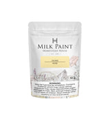 50g Homestead House Ochre Milk Paint pouch with floral and wagon art, plus a visible health warning label.