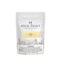 50g Homestead House Ochre Milk Paint pouch with floral and wagon art, plus a visible health warning label.
