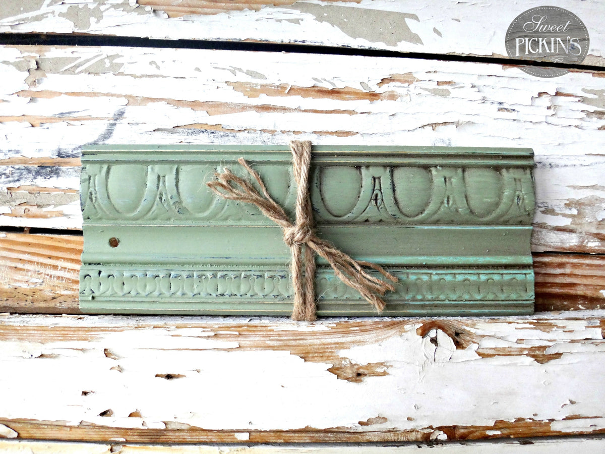 Green wood trim tied with twine, painted in Oh Olive! by Sweet Pickins Milk Paint, Old Fashioned Milk Paint Co.
