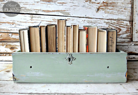 Wooden drawer painted Oh Olive! by Old Fashioned Milk Paint, repurposed as a book holder.