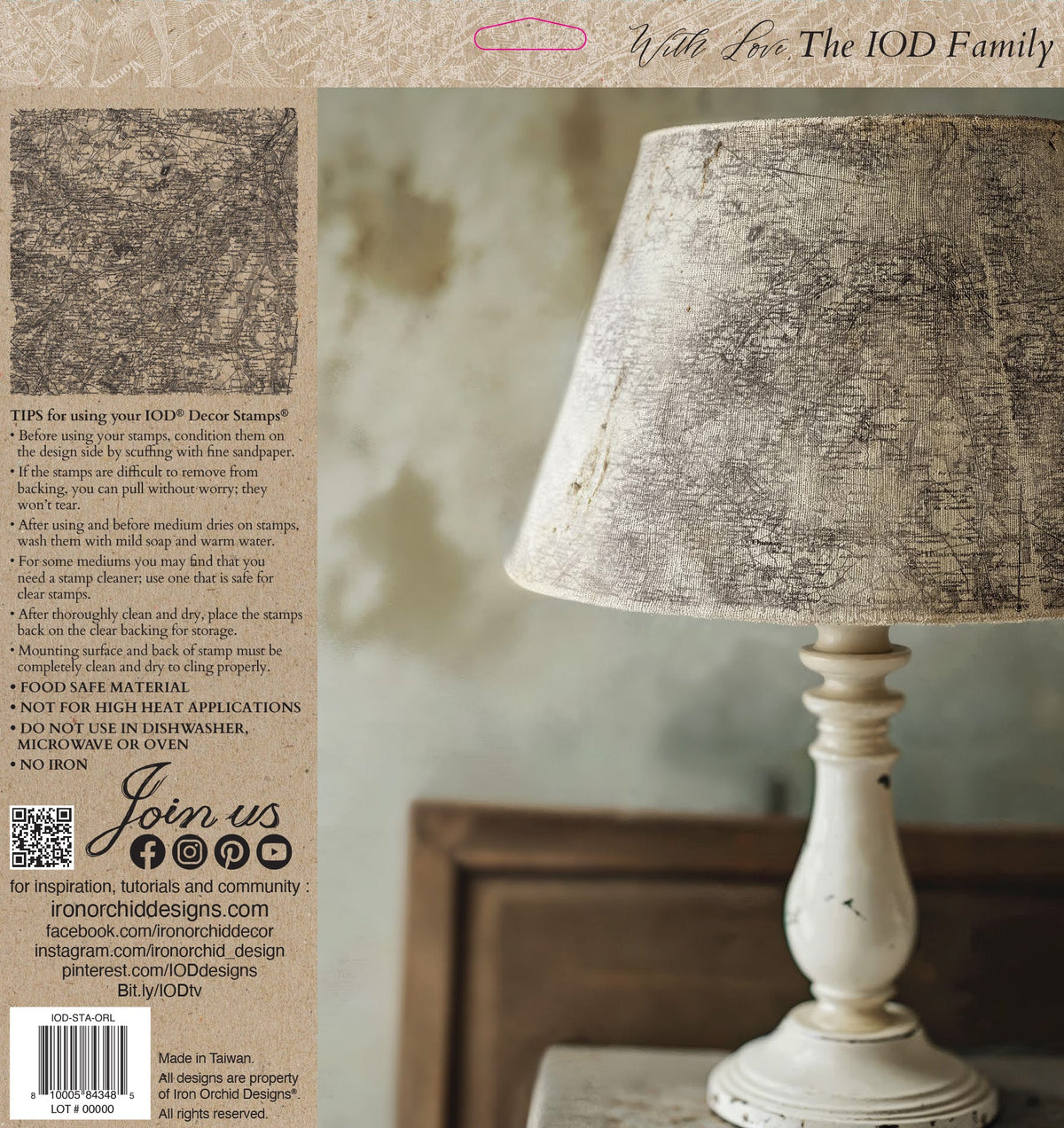 White lamp with I.O.D. Orléans Stamp map shade beside its packaging and instructions.