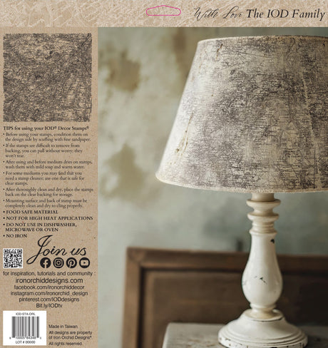 White lamp with I.O.D. Orléans Stamp map shade beside its packaging and instructions.