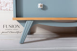 Paisley Fusion Mineral Paint cabinet leg with floral knob, matte finish, shown on a white floor.