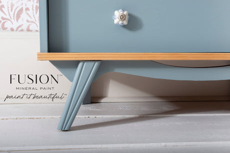 Paisley Fusion Mineral Paint cabinet leg with floral knob, matte finish, shown on a white floor.