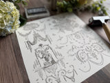 I.O.D. Palais des Fleurs Stamp by Iron Orchid Designs with black and white line drawing, flowers, and hammer nearby.