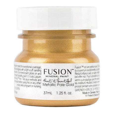 37 mL jar of Fusion Mineral Paint, Pale Gold Metallic, with gold paint visible inside the container.