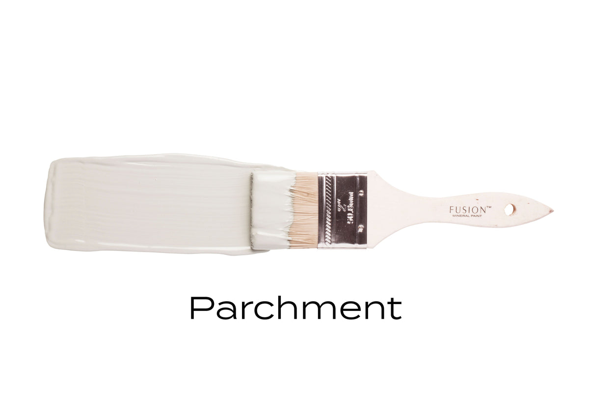 Fusion Mineral Paint brush in Parchment, labeled on the bristles.