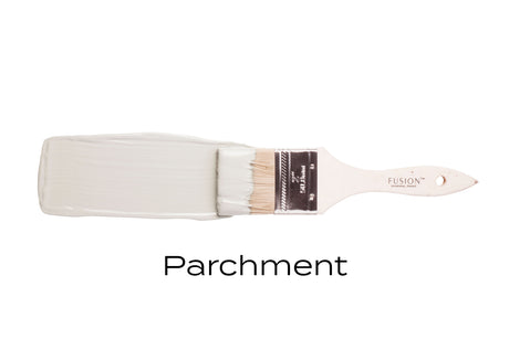 Fusion Mineral Paint brush in Parchment, labeled on the bristles.