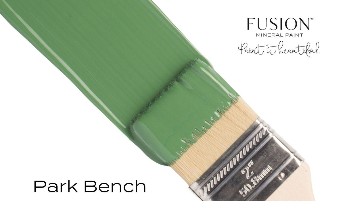 Paintbrush with green Park Bench by Fusion Mineral Paint.