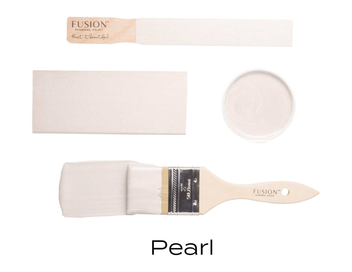 Four paint samples and a brush featuring Fusion Mineral Paint Pearl Metallic, a light shade with subtle mica pigments.