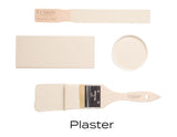 Two beige sample boards, a can of Plaster Fusion Mineral Paint, and a brush labeled Plaster matte finish.