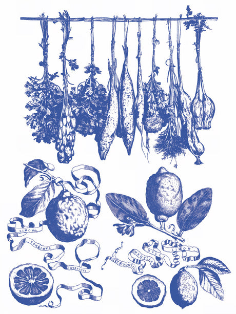 Herbs and fish hang above lemons with Portofino Paint Inlay by IOD’s azulejo tile pattern in the background.