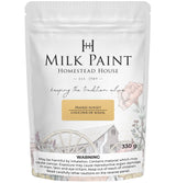 330g Prairie Sunset Milk Paint bag by Homestead House, featuring floral and wagon wheel illustrations.