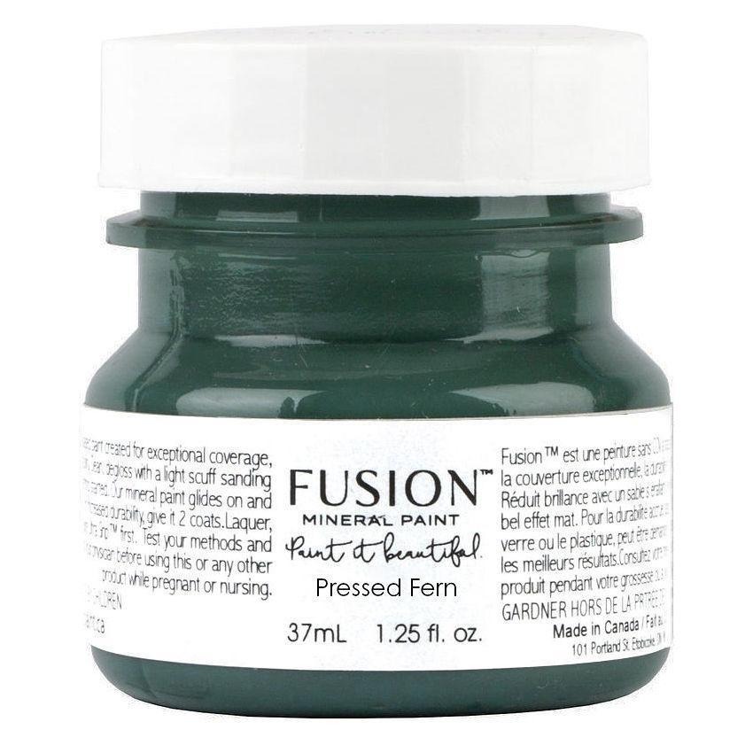 Fusion Mineral Paint 37mL jar in Pressed Fern, a dark green shade, with white lid and labeled front.
