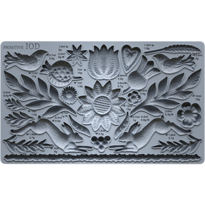Primitive Mould by IOD featuring detailed floral, leaf, bird, and animal designs for crafting projects.