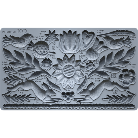 Primitive Mould by IOD featuring detailed floral, leaf, bird, and animal designs for crafting projects.