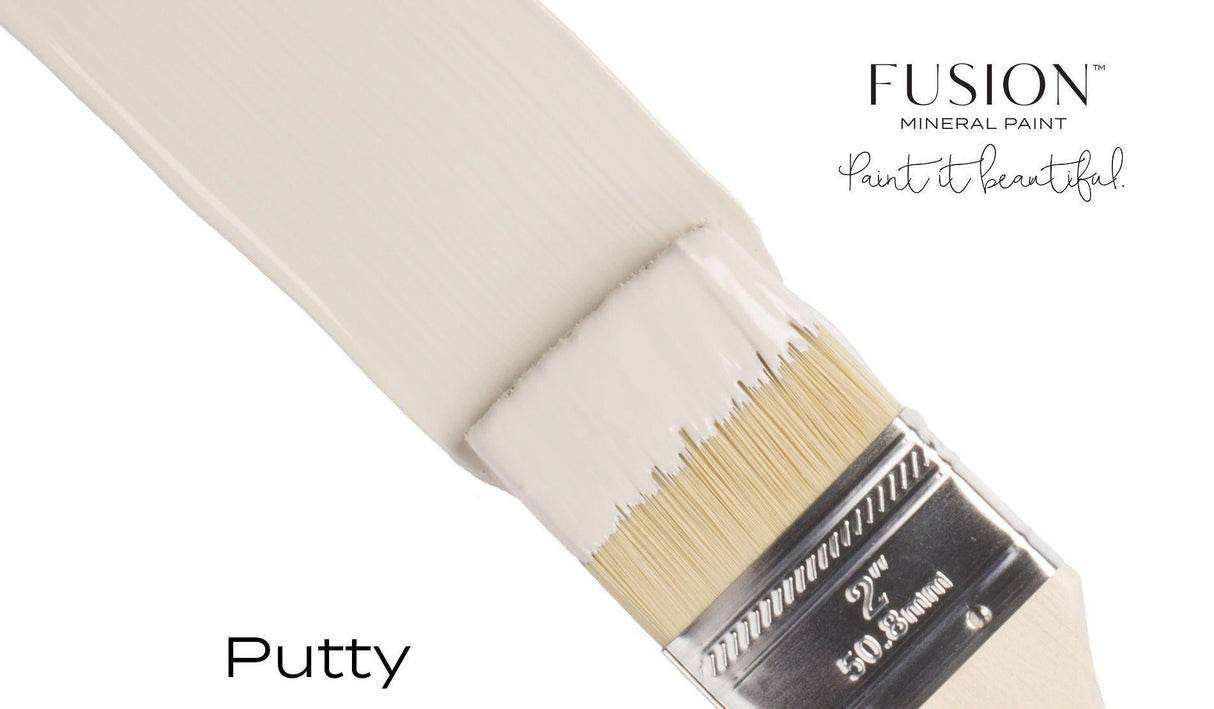 Paintbrush with beige Putty Fusion Mineral Paint, Fusion Mineral Paint logo, and “Paint it beautiful!” slogan.