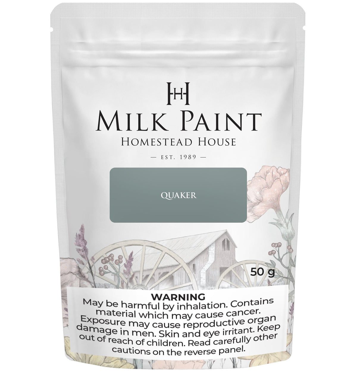 Quaker Blue Milk Paint by Homestead House, 50g bag, with floral design and warning label on the package.