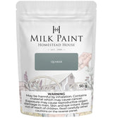Quaker Blue Milk Paint by Homestead House, 50g bag, with floral design and warning label on the package.