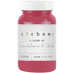 Fusion Mineral Paint Raspberry Alchemy chalk-style paint in a red jar with white lid.
