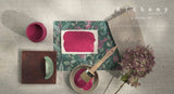Open Alchemy by Fusion Digital Downloads swatch on floral paper with brush, napkin, flower, and knife.