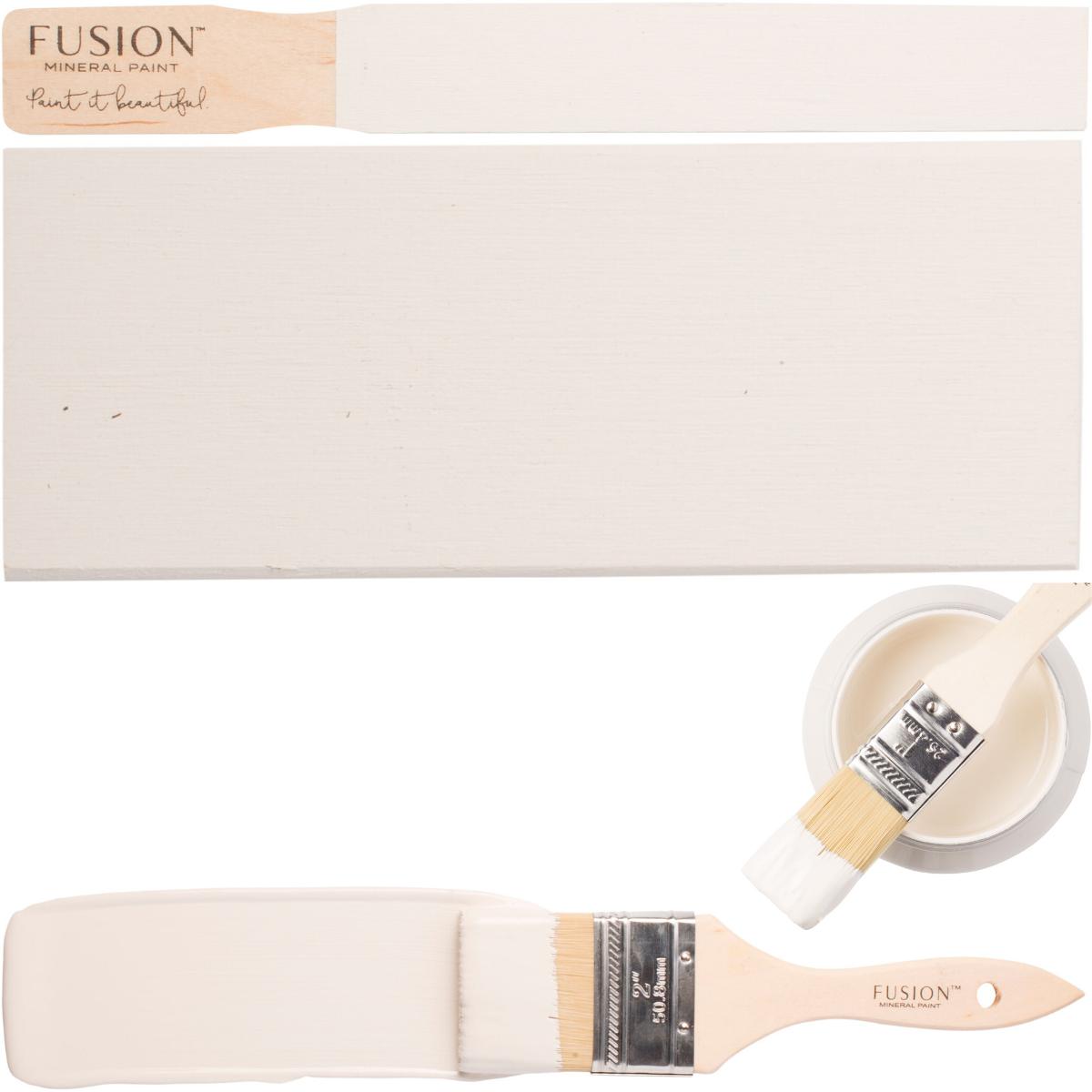 Paintbrush, board, and acrylic cup containing Raw Silk Fusion Mineral Paint by Fusion Mineral Paint.