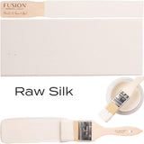 Fusion Mineral Paint Raw Silk acrylic paint container with paintbrush and swatches.
