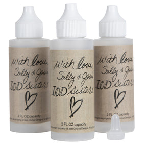 Set of three 2oz IOD refillable mixing bottles with handwritten-style “IOD Sisters” labels by Iron Orchid Designs.