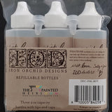 Set of 3 I.O.D. refillable bottles with white caps, bundled together with a brown Iron Orchid Designs label on front.