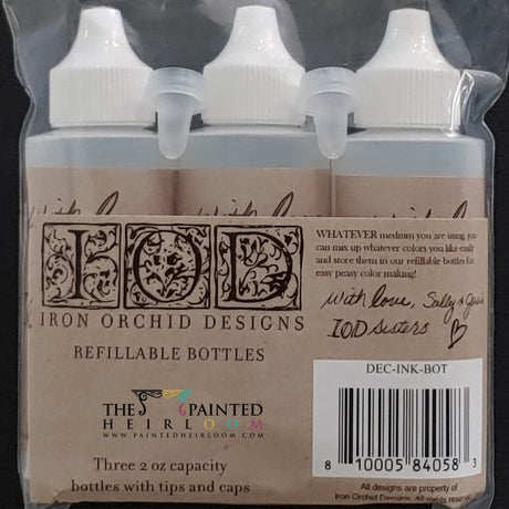 Set of 3 I.O.D. refillable bottles with white caps, bundled together with a brown Iron Orchid Designs label on front.