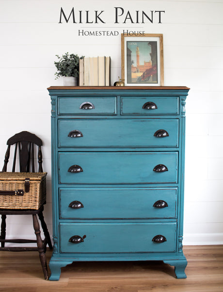 Teal dresser in Homestead House Renfrew Blue Milk Paint with black handles.