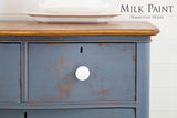 Wooden dresser painted Rideau Blue with a white knob and Homestead House branded label.