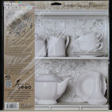 Rose Toile Stamp by IOD from Iron Orchid Designs featured in a DIY project with white porcelain on shelves.
